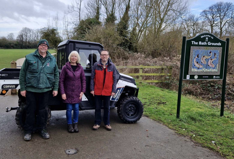 Mark Fern, Cllr Liz Parle and Cllr Chris Smith with the new vehicle at the Bath Grounds in Ashby. Photos: Ashby de la Zouch Town Council