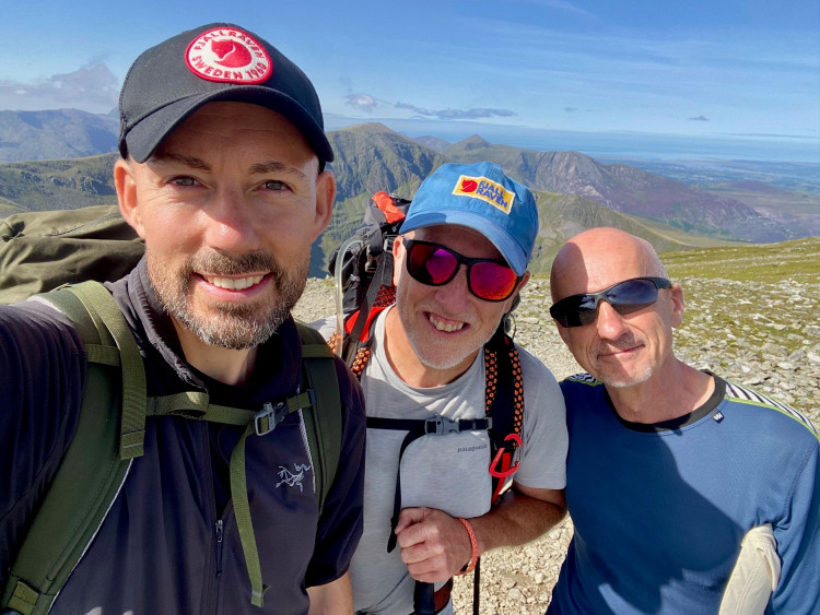 (L-R) Andy Motch, hereditary brain aneurysm survivor and Mountain Leader, with fellow Mountain Leader colleagues Steve Turner and Pete Cloran. Photo: HBAS