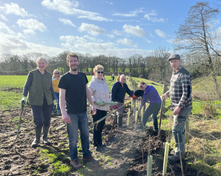 Goostrees volunteers helped plant the remaining 100 metres of hedgerow at Bridge Farm, Blackden near the iconic Jodrell Bank telescope (Image-supplied).