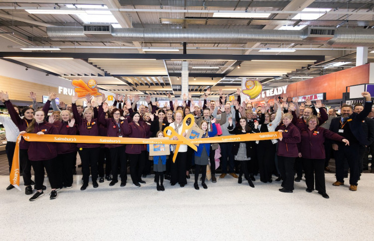 The first 500 customers through the doors this morning received a special-edition Sainsbury’s bag for life, featuring a design by Betsy Abbott, a pupil at nearby Excalibur Primary School. (Photo: Sainsbury's)