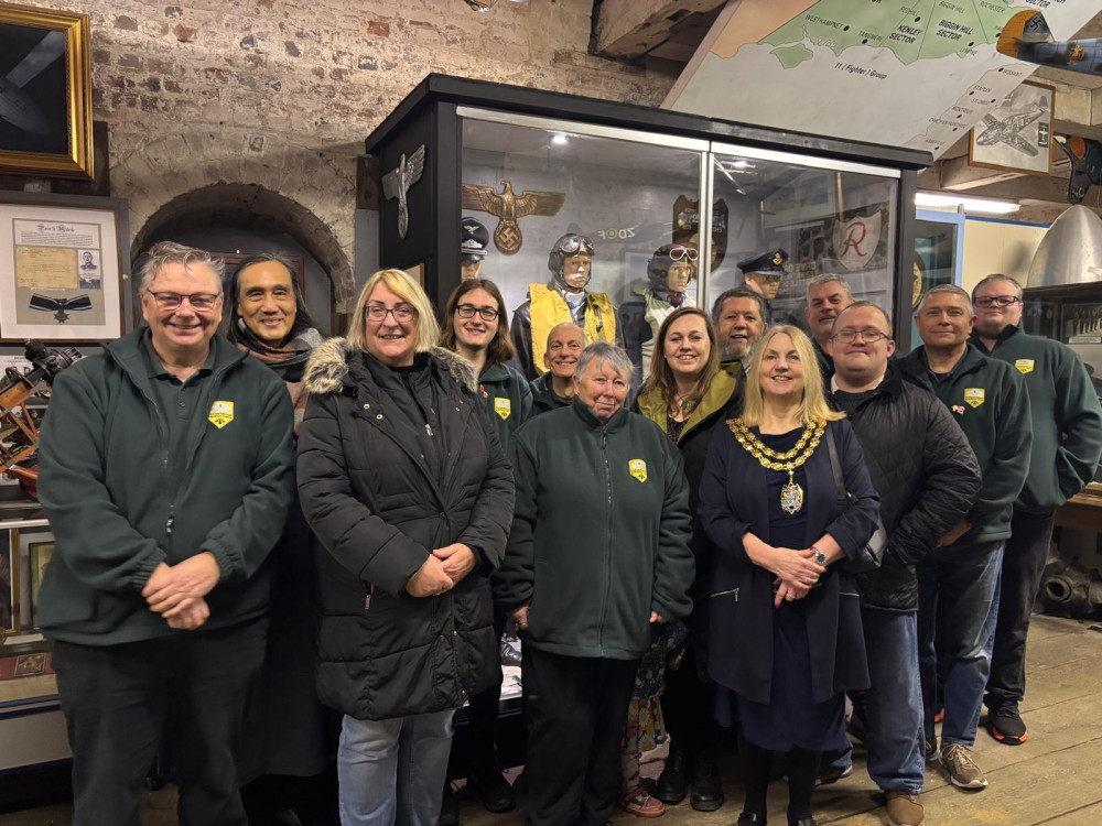 Guests and volunteers at the opening. 