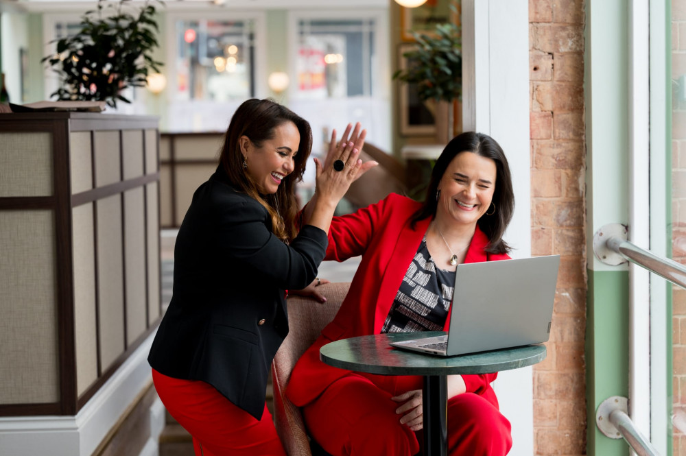 Bianca and Amanda celebrate marketing success! (image via Dave Perry Photography)