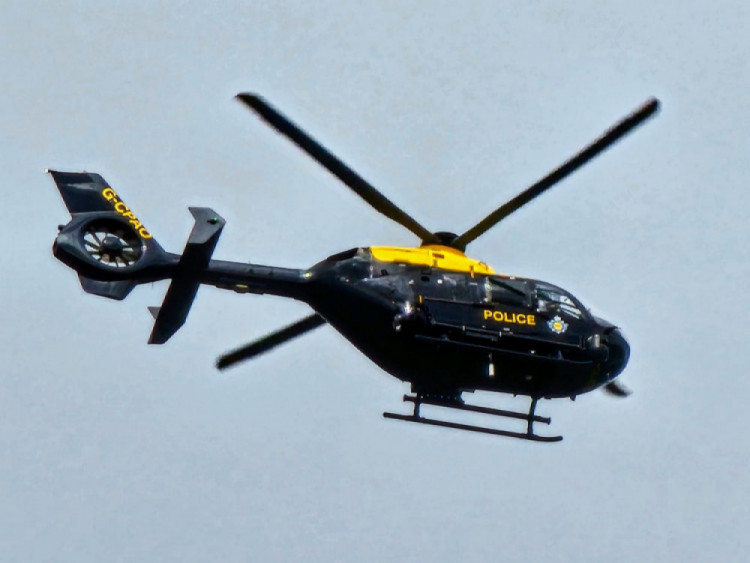 A police helicopter was spotted in the sky high above Rode Heath earlier today. (Photo: Nub News)