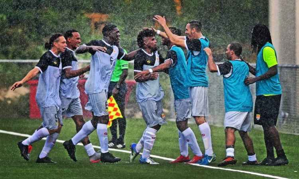 Ben Pugh's Cayman Island team celebrate