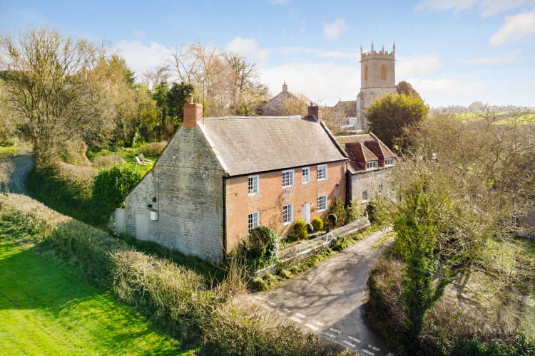 A beautifully restored 18th-century home, this elegant seven-bedroom property blends period charm with modern comfort.