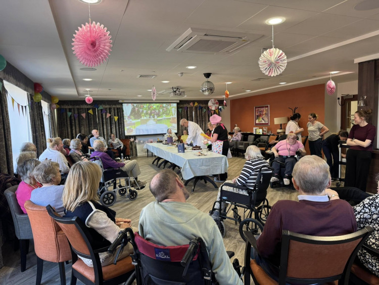 Staff and residents at dementia specialist, Belong Chester, celebrated World Book Day (Image via: Belong)