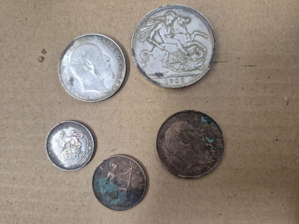 Historic coins found during dating back to 1904 and 1906. (Photo: Mid Cheshire Hospitals)