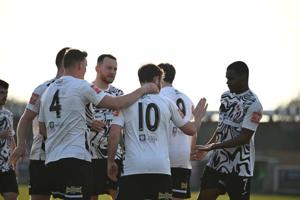 Tilbury celebrate Jamie Reynolds (10) scoring against Basildon. Picture by Paul Bocking (InFocus Photos).