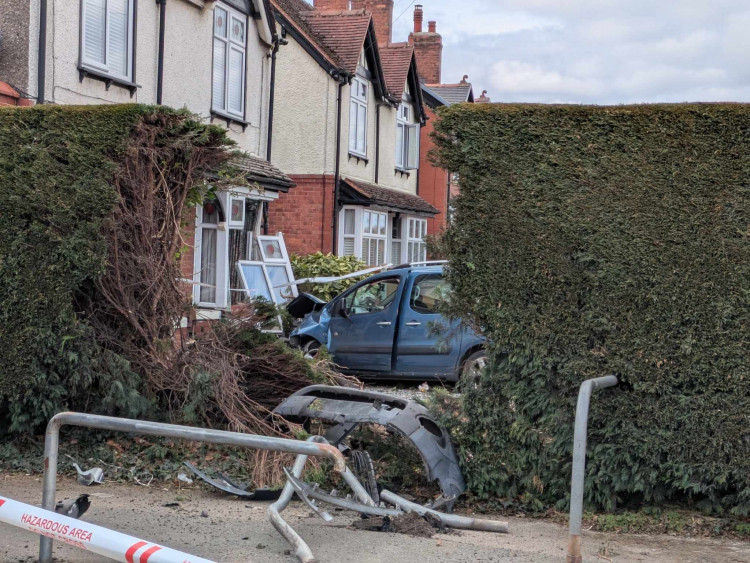 The car left the road and collided with the front of a house in Middlewich Road, Elworth today (Tuesday). (Photo: Nub News)