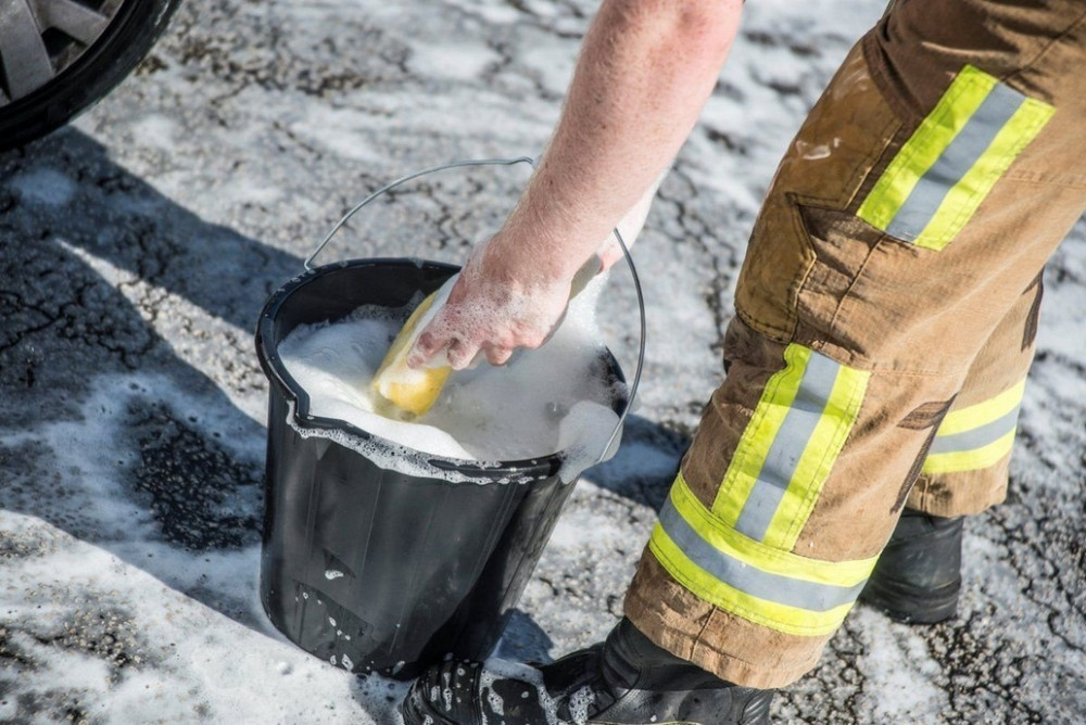 Firefighters in Wilmslow will swap their hoses for sponges as they raise money for charity (Credit: Cheshire fire and rescue service).