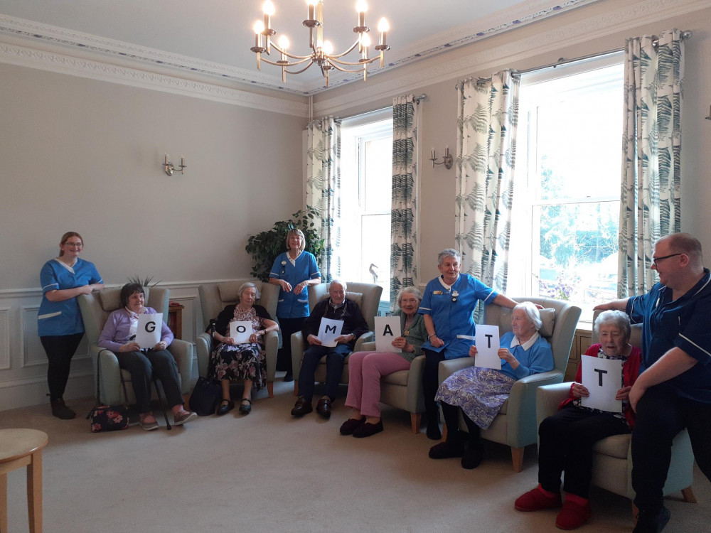 Field House residents and colleagues ready to cheer on Deputy Manager Matt © Somerset Care Group