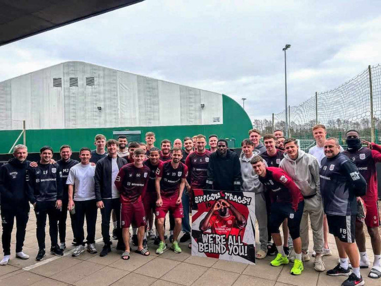 On 18 March, Crewe Alex players presented Shilow Tracey with the giant card at the club's Reaseheath training ground, leaving him lost for words (Crewe Alex). 