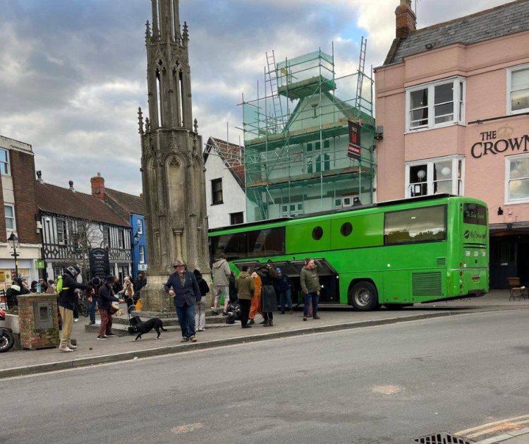 The Big Green Bus parked at the Market Place in Glastonbury