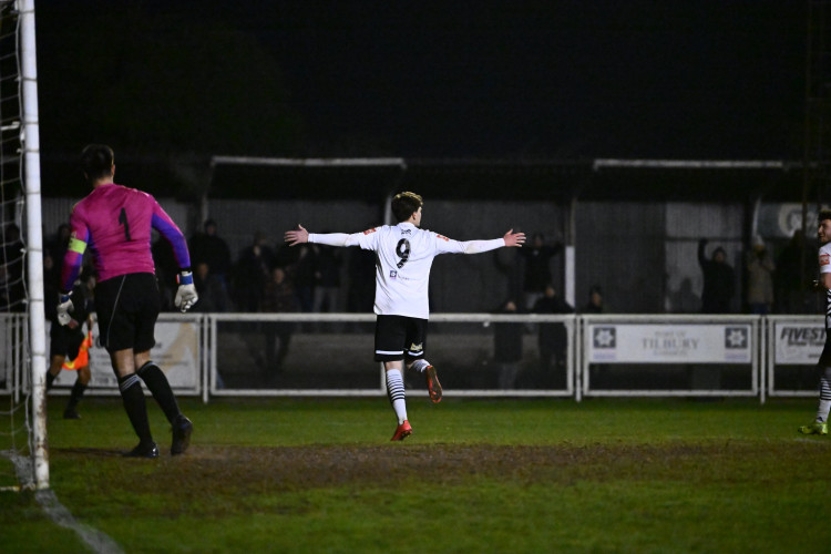 Alex Hernandez celebrates his late penalty success. 