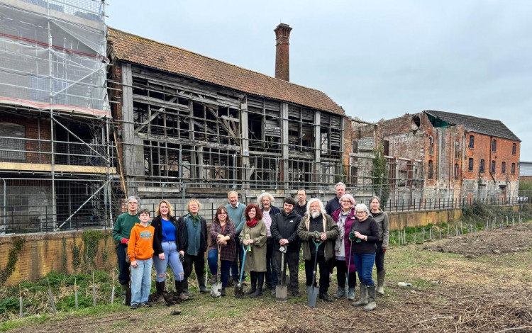 Volunteers dig deep to create wildlife corridor at Glastonbury regeneration site