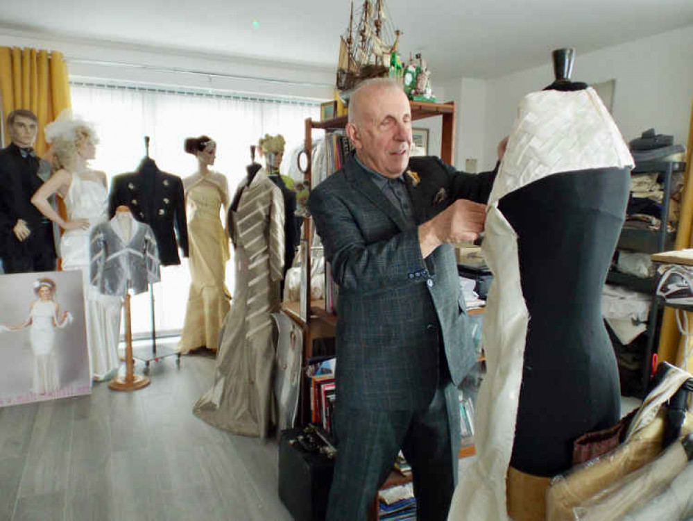 Malcolm Hall working on a dress at his new Admiralty Pier studio