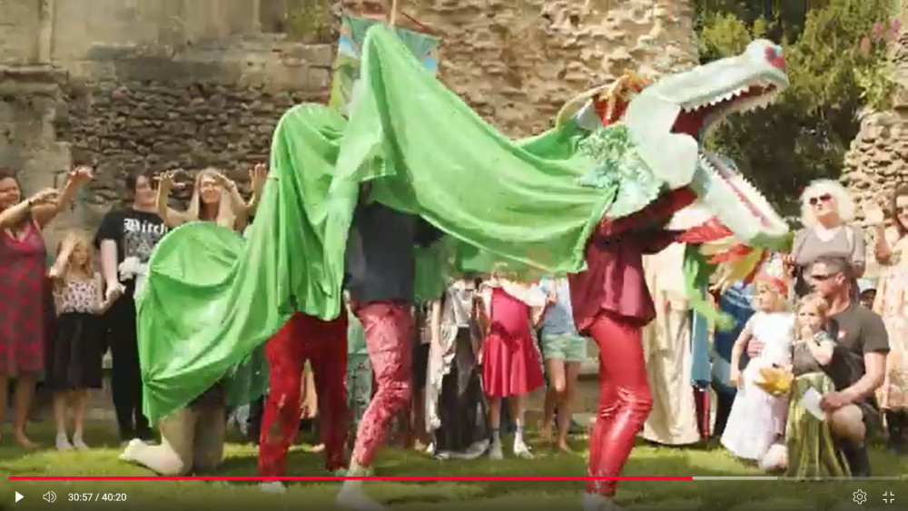 The healing of the Dragon, still from Flying Tiger film of THE GLASTONBURY ST GEORGE & DRAGON MUMMERS PLAY