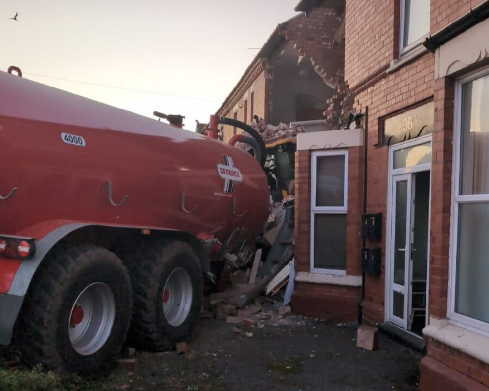 The tractor had collided with two houses (Image via: Darren Kearn) The tractor had collided with two houses (Image via: Darren Kearn)