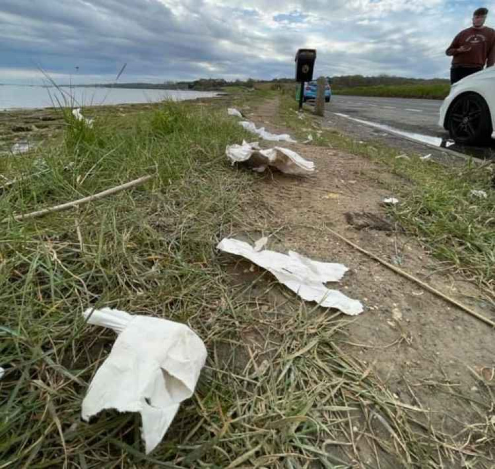 Litter strewn along the Strand