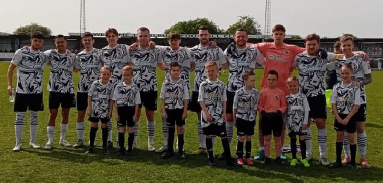 Dockers' final line-up of the season with mascots Tilbury Scorpions U8s.