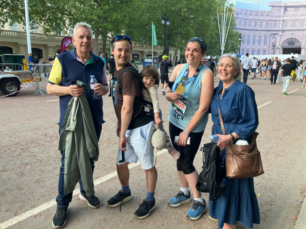 Lucy was greeted by her family, including daughter Jasmine, after completing her run. Lucy was greeted by her family, including daughter Jasmine, after completing her run.