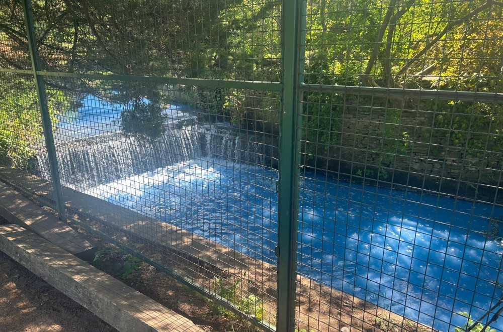 The River Dean has turned blue (Credit: Nub News)