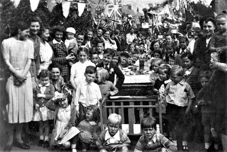 Alton Street residents celebrating VE Day in 1945. This will be on display at Crewe Heritage Centre's new WWII exhibition, running from May 3 to October 19 (Mpire Books).