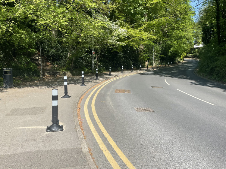 Wilmslow Town Council has purchased and installed bollards along the pavement on Cliff Road to prevent pavement parking (Image-supplied).