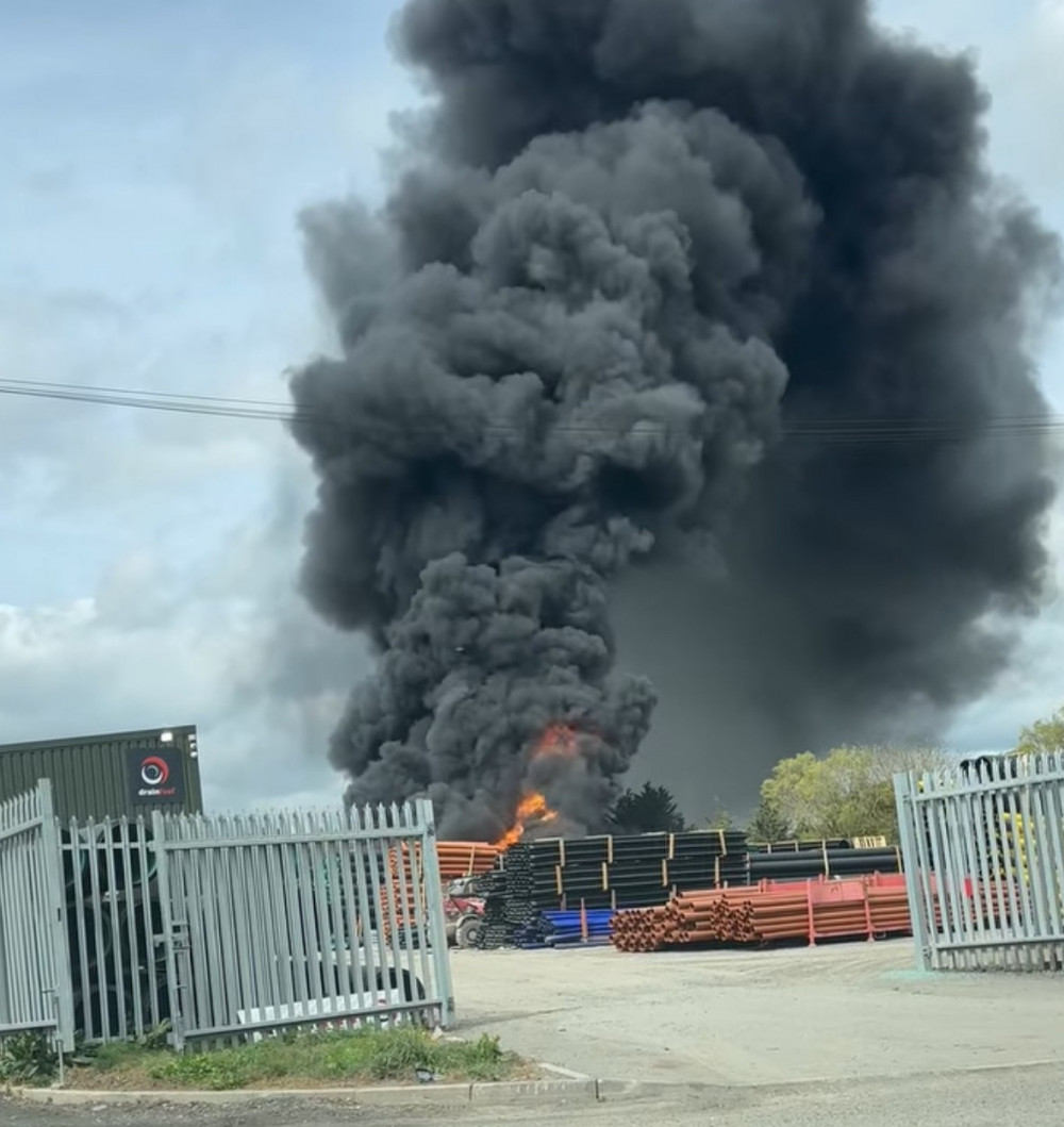 The fire at the green belt industrial site caused a huge plume of smoke. The fire at the green belt industrial site caused a huge plume of smoke.