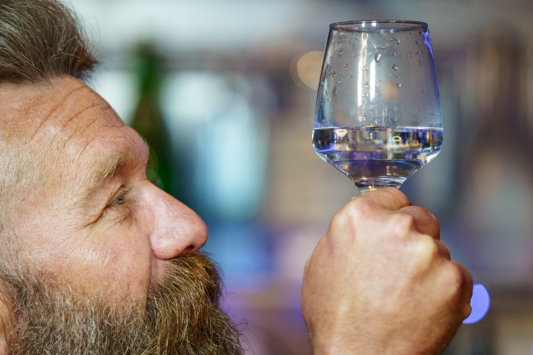 Water sommelier Doran Binder says he hasn't drunk from the tap in 12 years (Credit: SWNS)