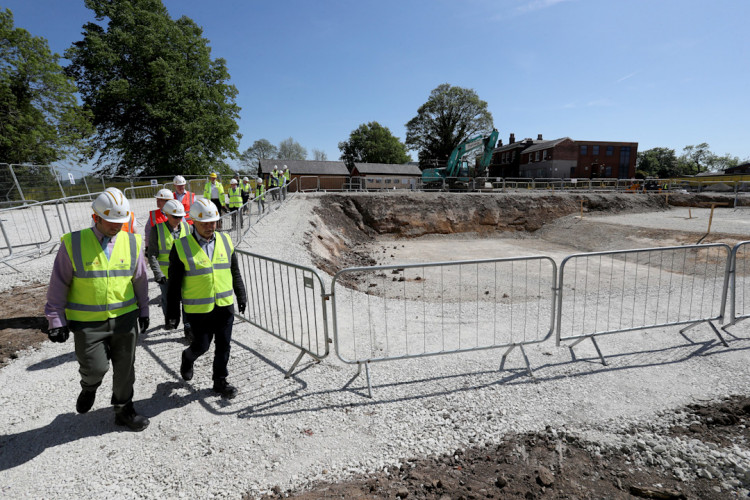 Work on the new £20m Marple Community Hub is officially underway, as the first ground was broken on the site (Image - Stockport Council)
