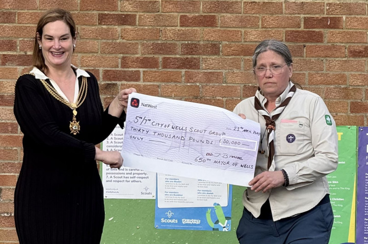 The Mayor of Wells presented a £30,000 cheque to the 5th/7th Wells Scout Group for hut refurbishments after a successful year-long fundraising campaign. (Photo: Wells City Council) 