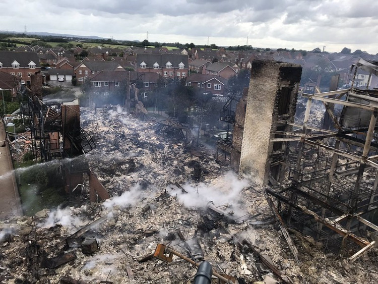 Four companies are facing a total of 14 charges over their roles in the fire that ripped through Beechmere, Rolls Avenue, on 8 August 2019 (Cheshire Fire and Rescue Service).