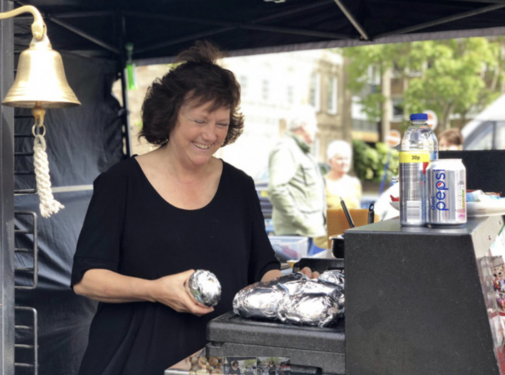 Viral potato seller Spud Man shows support for Warwick's potato lady (images via Nina Kelly) Viral potato seller Spud Man shows support for Warwick's potato lady (images via Nina Kelly)
