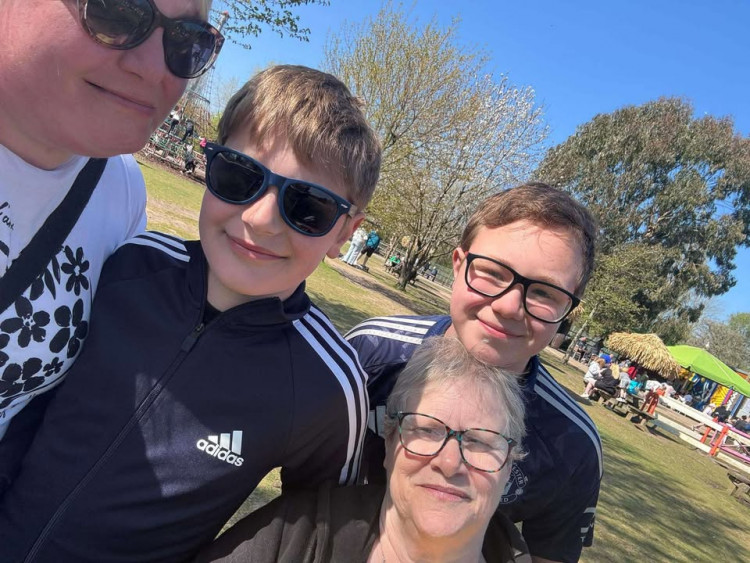 Claire with sons Adam and Dan and her mum, Helen (Credit: Claire Jackson)