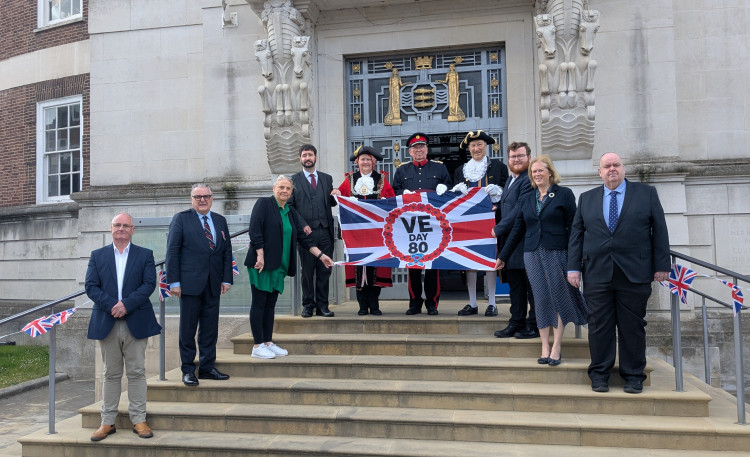 The Mayor of Kingston, Councillor Liz Green, was joined by a small civic party on the steps of the Guildhall (Credit: Kingston Council)