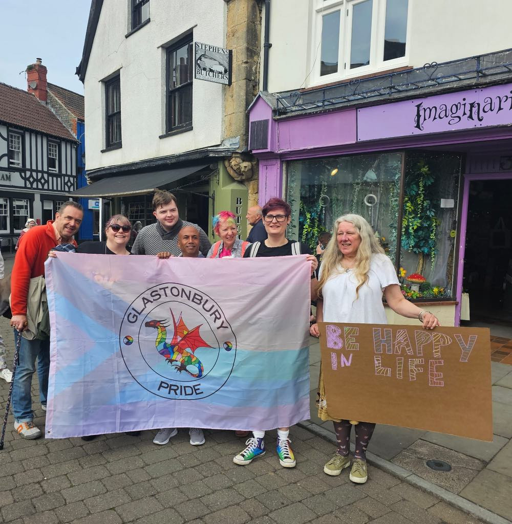 Proudly waving the Glastonbury Pride flag Proudly waving the Glastonbury Pride flag