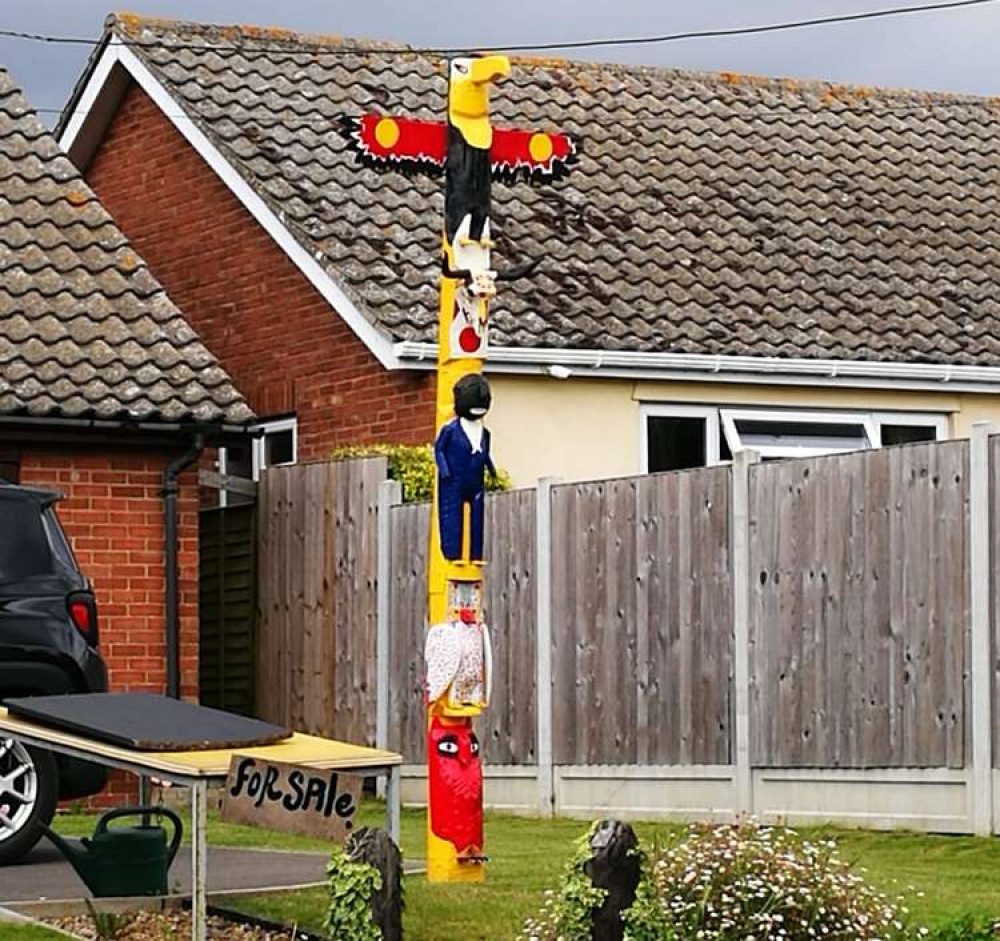 Totem pole in a garden on Bergholt Road in Brantham