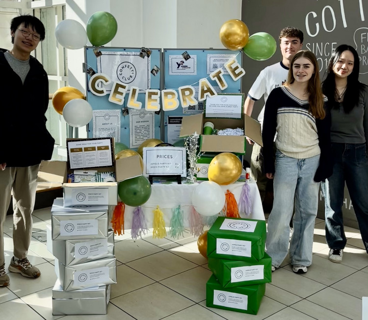 Team members selling the products and promoting Confetti Club at a trade fair in the Royal Priors Shopping Centre (image supplied)
