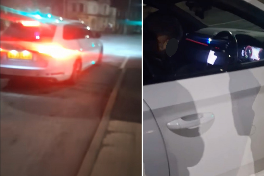 The two officers were filmed 'asleep' in a car in Fenton on February 10. (Levi Brown) The two officers were filmed 'asleep' in a car in Fenton on February 10. (Levi Brown)