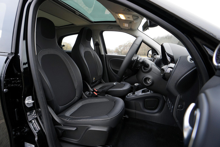 The rubber and carpet boot mats from CarMats4u offer durable protection. (via Pexels)