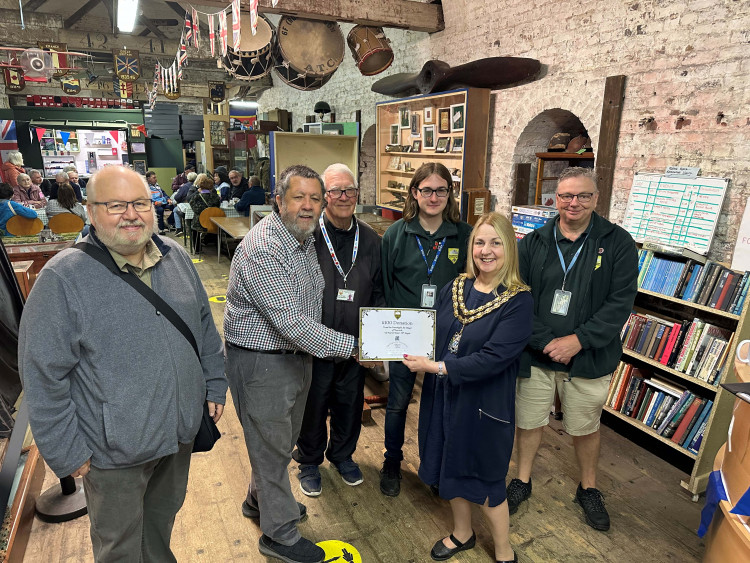 Mayor Cllr Kairen Raper with Trevor Batchelor (second from left) and volunteers.