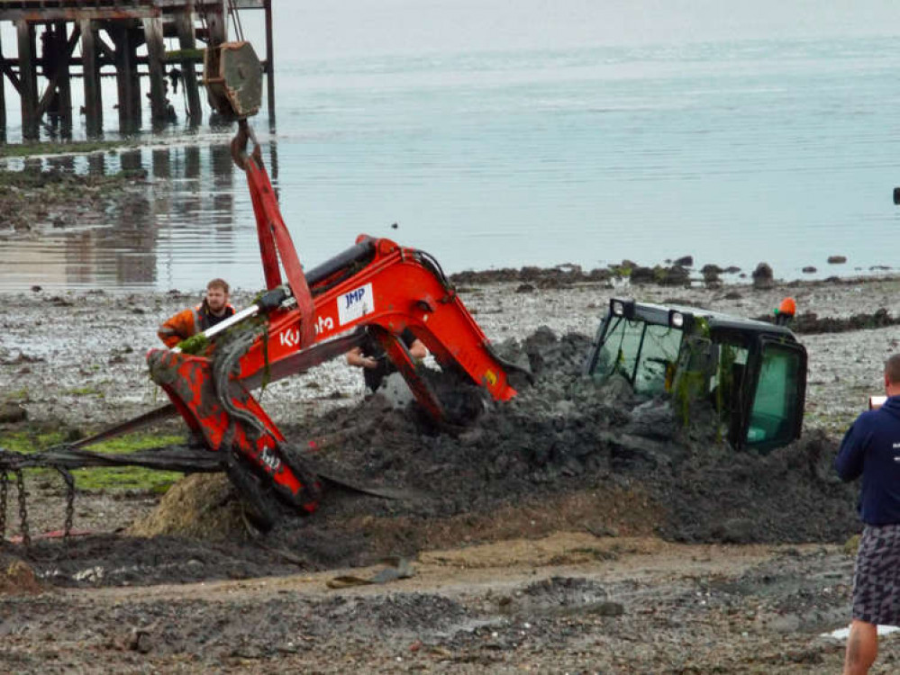 Digger got stuck in mud, at an estimated cost of more than £70k Digger got stuck in mud, at an estimated cost of more than £70k