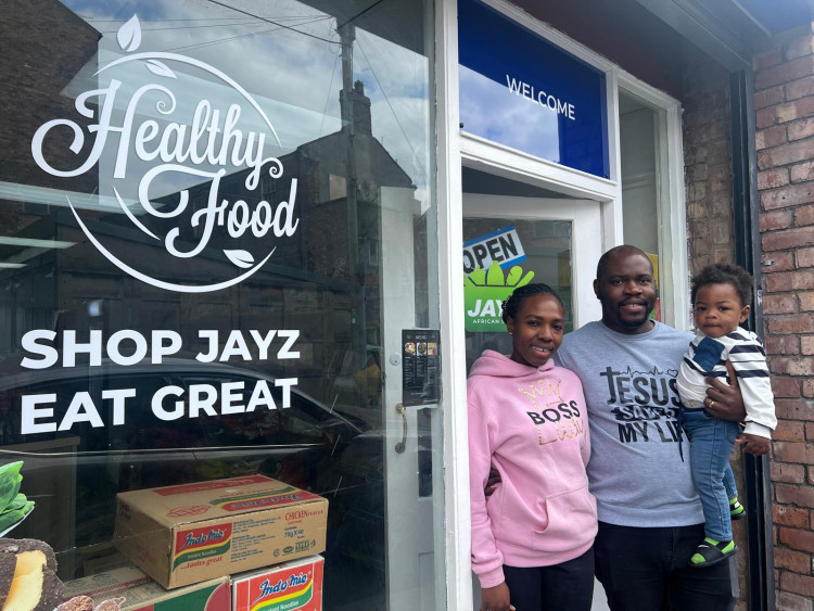 Jess and Uche John with their son, Zamar (Credit: Nub News)