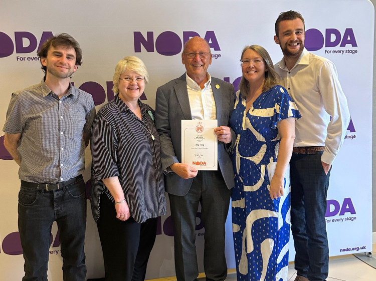 Courts collecting their Best Drama Award for the 2024 production of Allo Allo