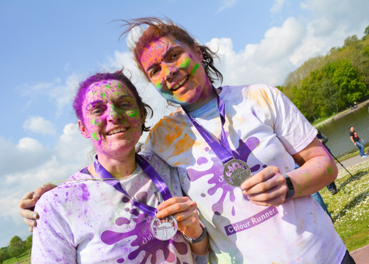 Debbie Jones (Left) with Sue Wilson showing off their medals after the 2019 Colour Runner. (Supplied)