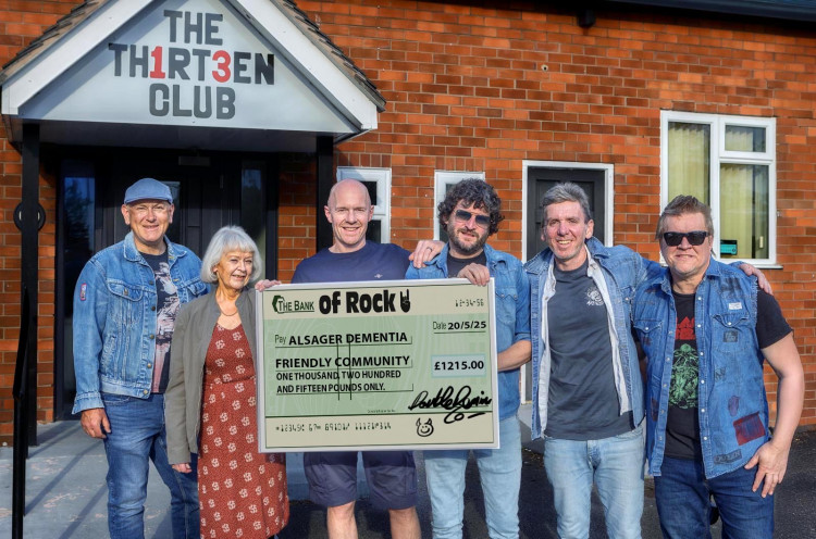 Rock against dementia - the Double Denim Company hand over the cheque to Dementia Friendly Alsager. (Photo: Peter Weatherburn)