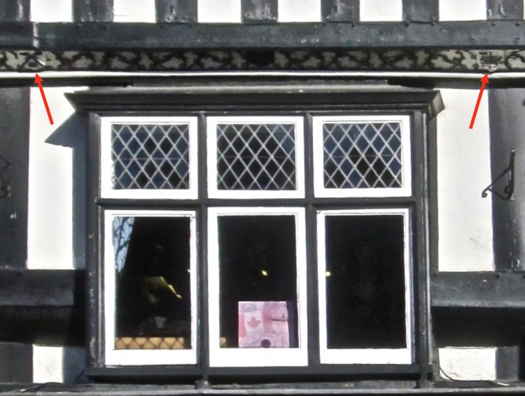 Shields above first floor window