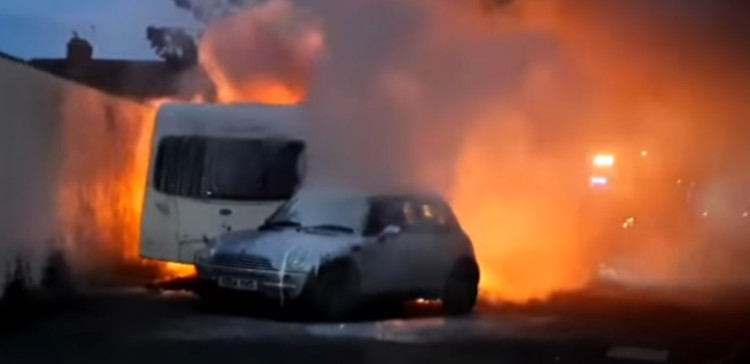 Deliberate fire devastates two caravans and a garage in Glastonbury. (Supplied) 