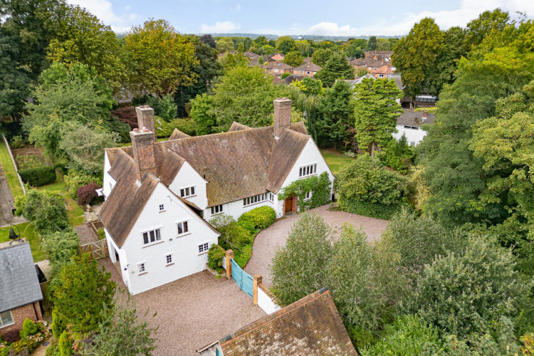 Privacy is provided by numerous mature shrubs, hedging and trees (Thornley Groves)